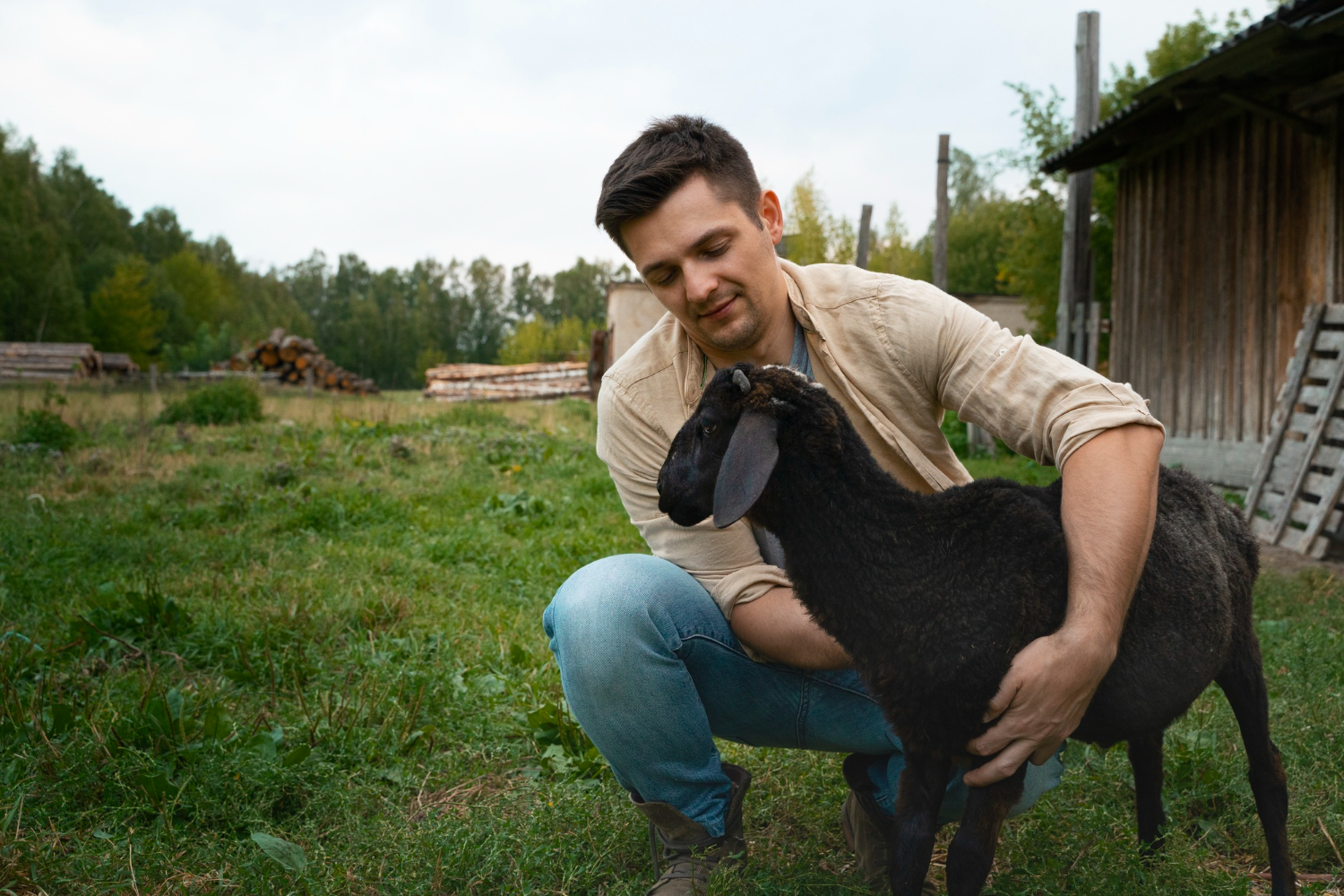 Man with black goat